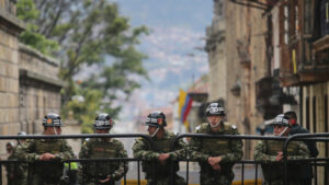 Presidential guard soldiers keep watch during the referendum on a peace accord to end the five-decade-long guerrilla war between the FARC and the state on Sunday in Bogota, Colombia. Colombian voters rejected the peace deal in a very close vote